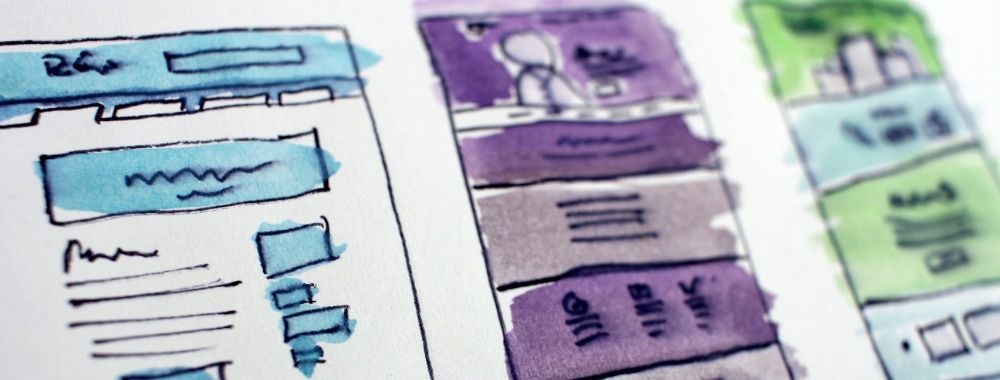 wireframe sketches created with pen and watercolor paint
