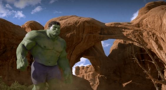 A movie still from Hulk. Features a monstrous creature set against a desert landscape. 