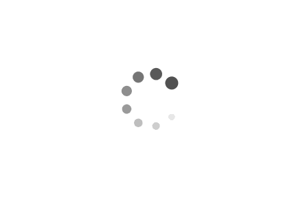 gif with a loading animation. Several dots make up a circle which change size to spin the circle. The word 'loading' appears beneath it.