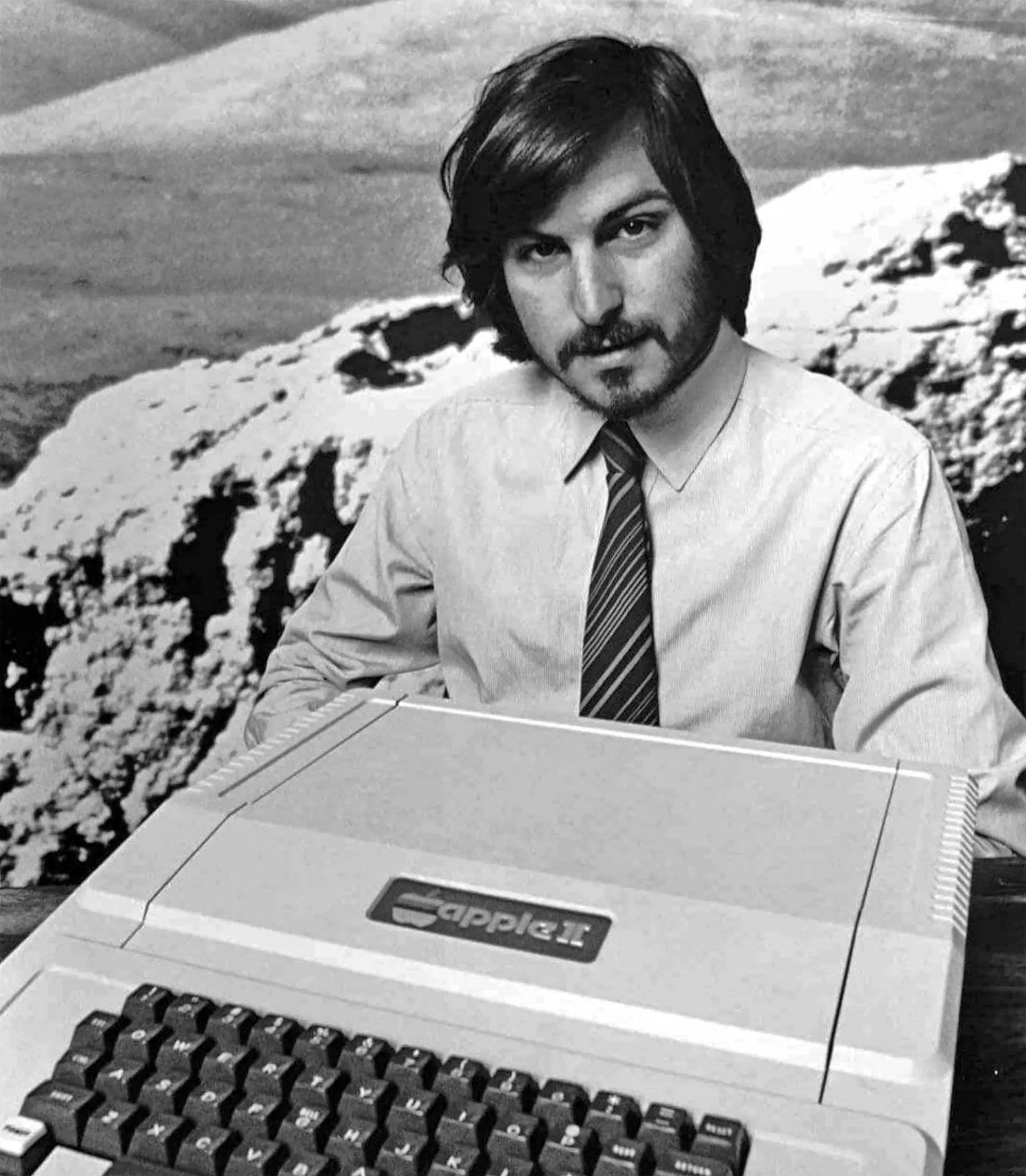 A photograph of Steve Jobs with the Apple II circa 1977.