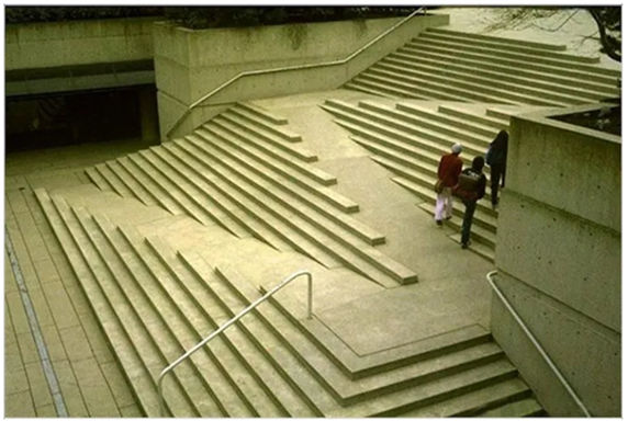 Architectural design of steps with zig-zag ramp built in to represent universal design.