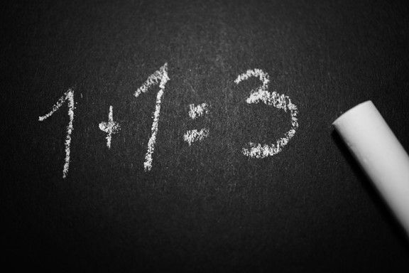 Picture of a chalkboard with numbers on it.