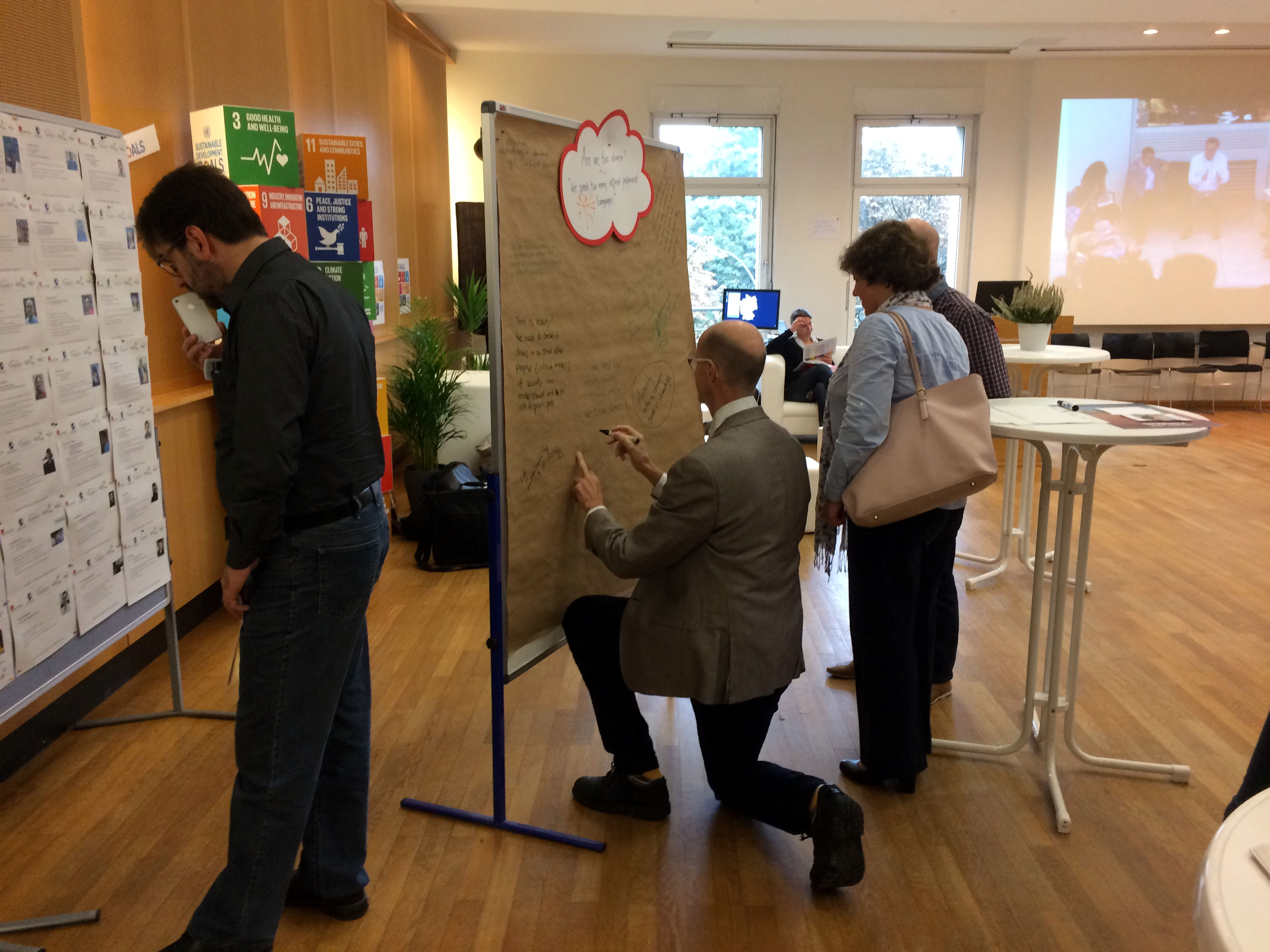 Image of people engaged in a brainwalking session.