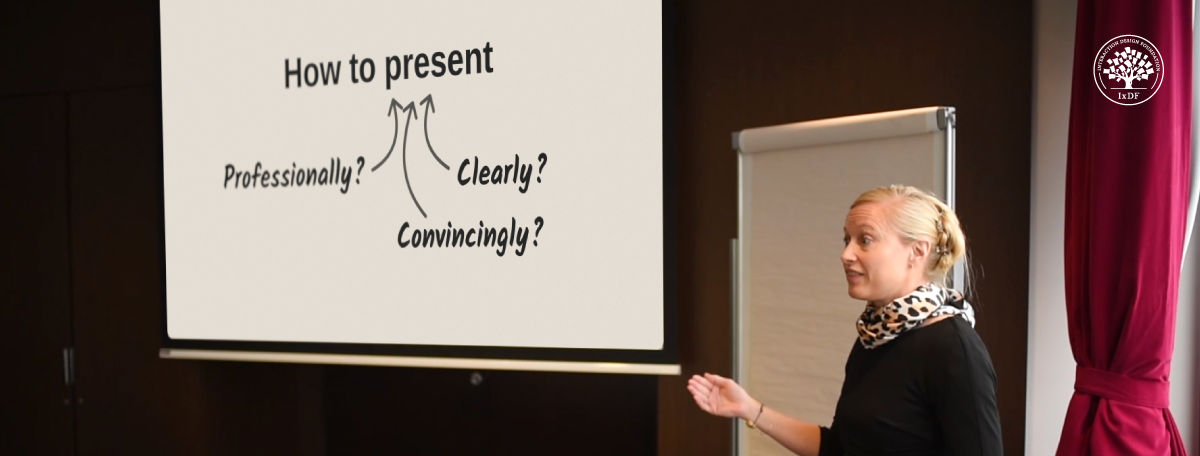 An image of a person giving a presentation.