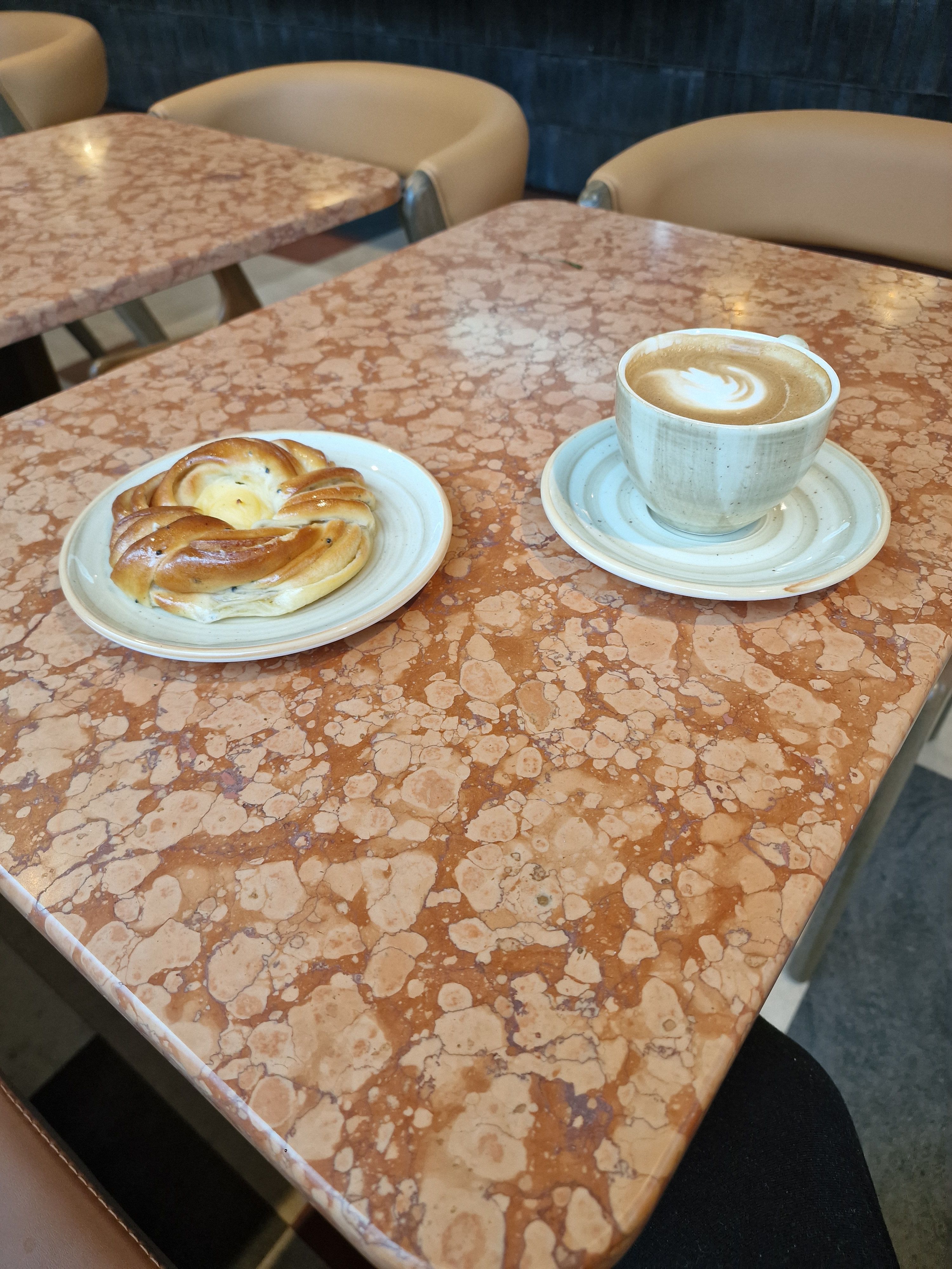 vanilla bu & cappucino on a table