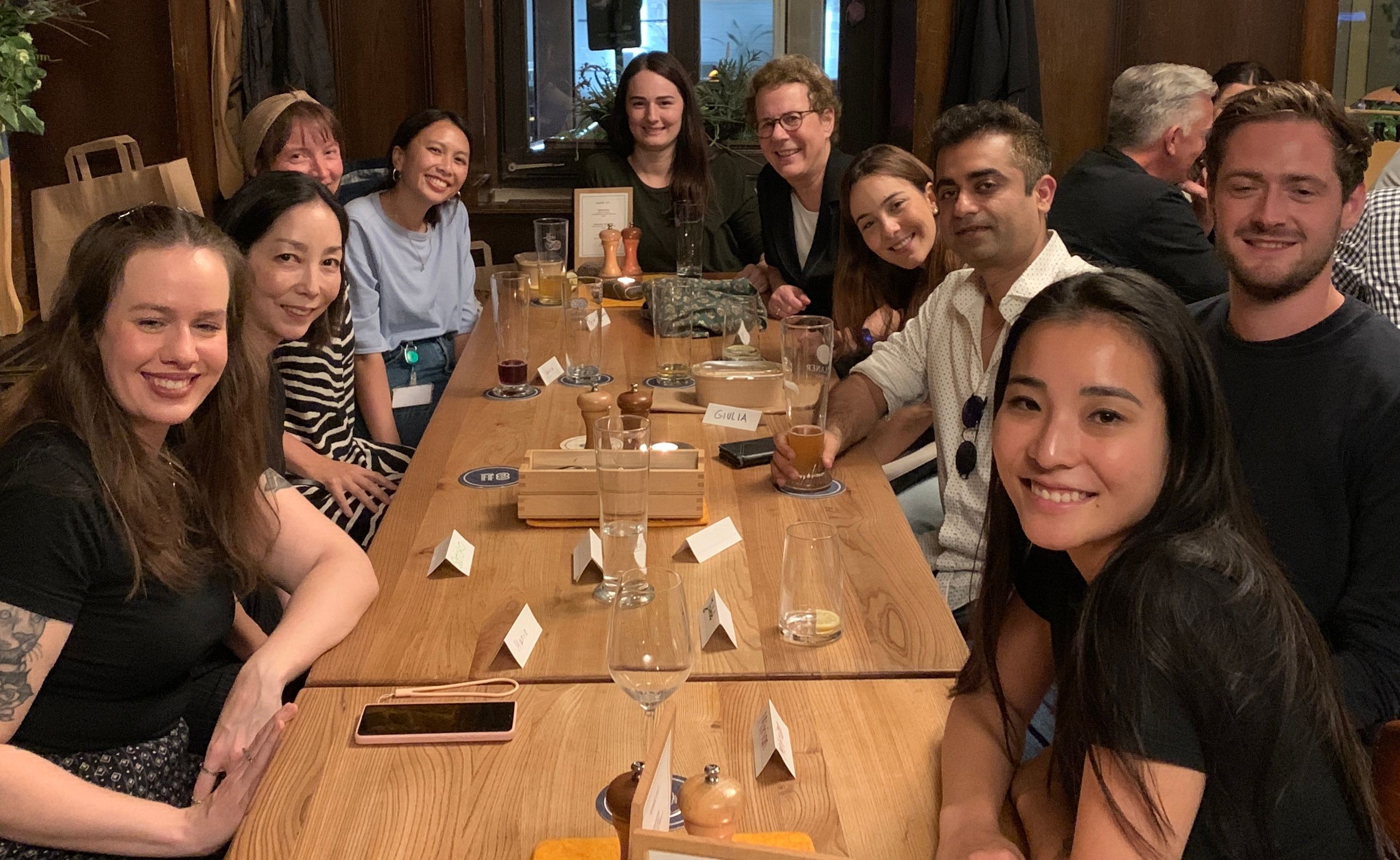 Group of people sitting at a table in a Bavarian restaurant